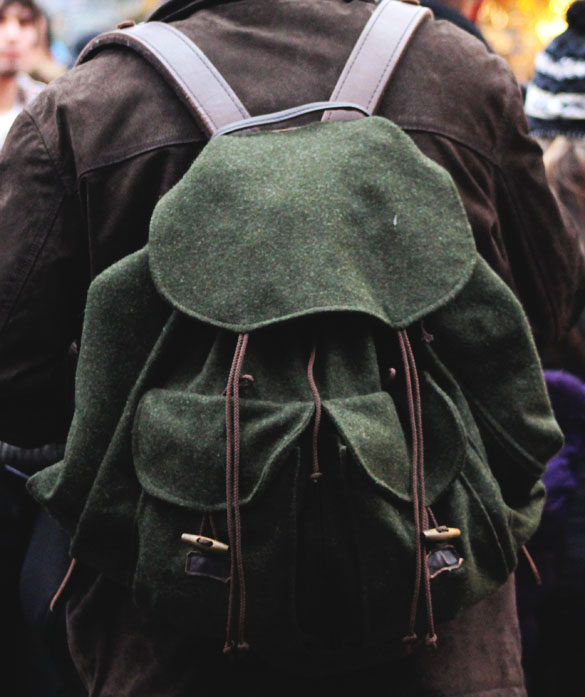 green backpack from felt and leather
