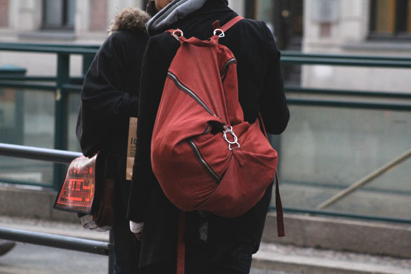 red backpack with unique cut