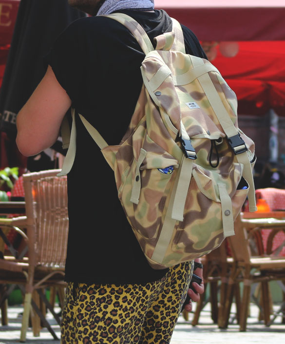 camo backpack and leopard shorts